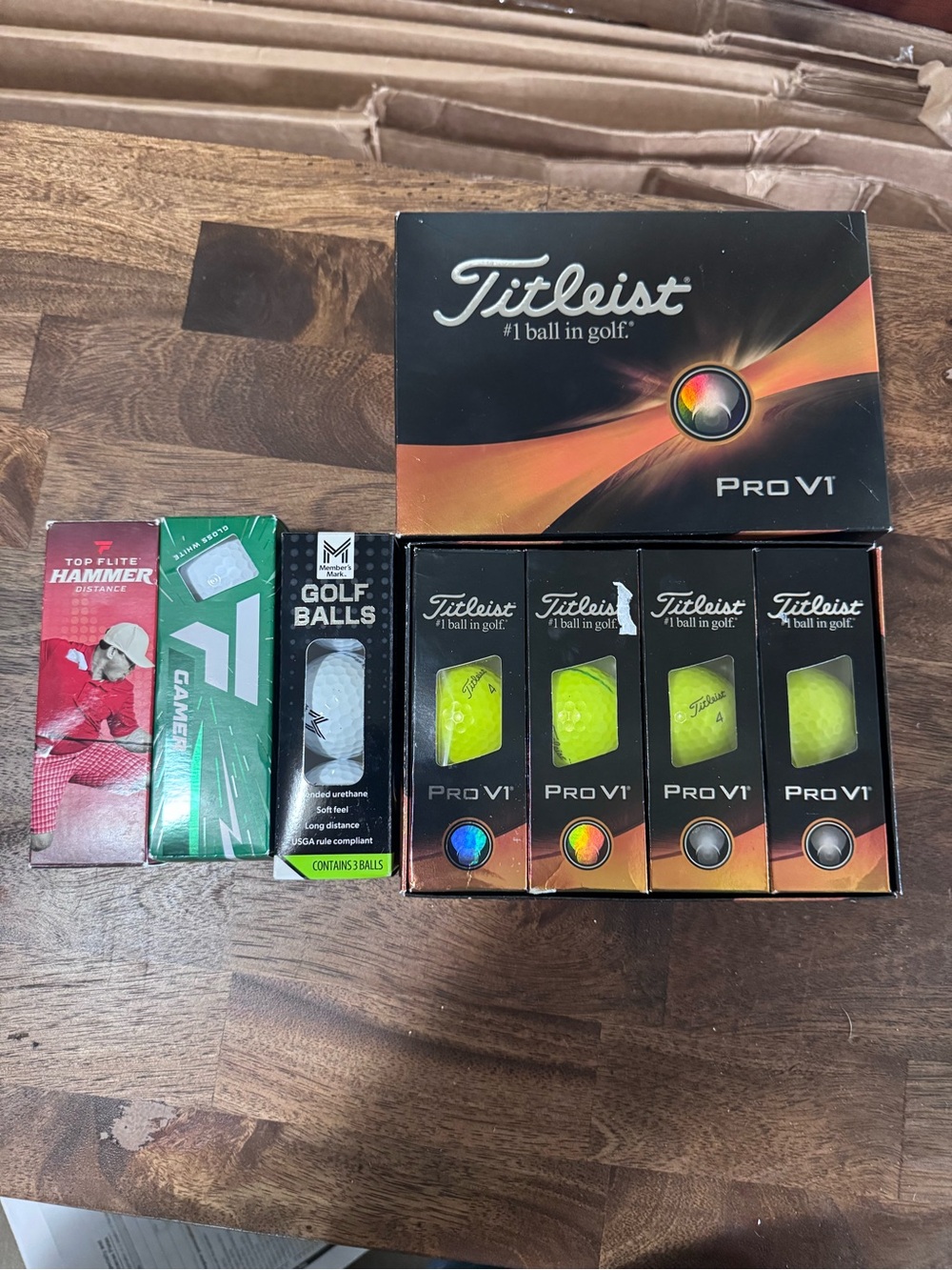 Titleist Pro V1 Yellow Golf Balls with other golf balls all new in the box